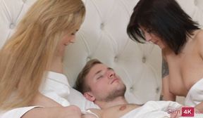 Two gorgeous girlfriends decide to fuck a horny dude in an FFM threesome