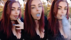 Smoking a Marlboro outside at a rest stop