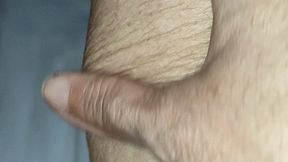 Red toes on white sheet