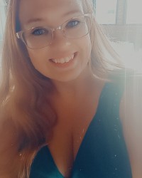 Sexy Outfits with Long Haired Curvy Redhead photo