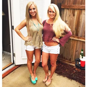 Little white shorts. Tan legs.