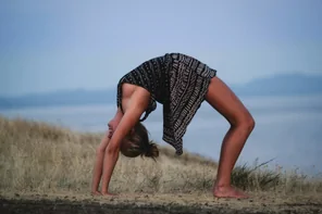 Yoga babe's nipple just barely covered