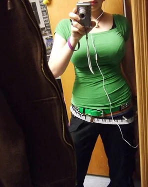Probably pretty girl with big boobs taking an innocent self shot