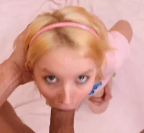 Holding her tits 