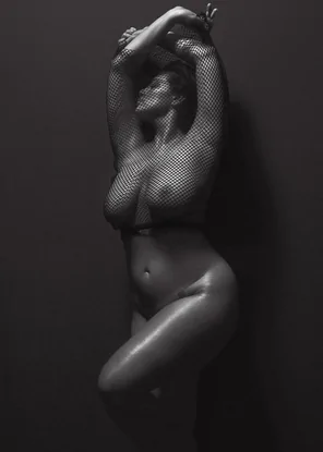 Ashley Graham posing for V Magazine