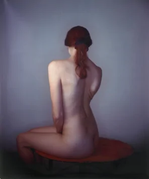 From behind