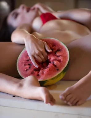 Playing with Her Melon