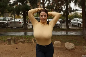 Angela White shows sweater meat