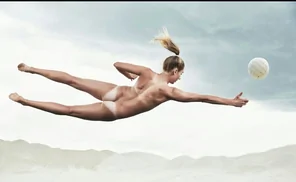Beach volleyball player lost her uniform.