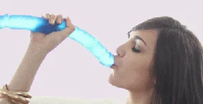 Holly Michaels deepthroats entire dildo