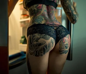 Just a tattooed ass in lingerie