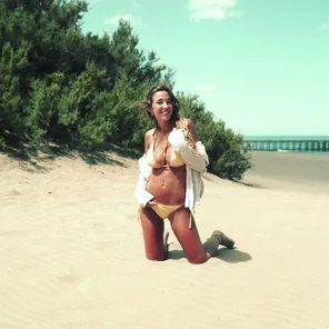 Kneeling down at the beach!